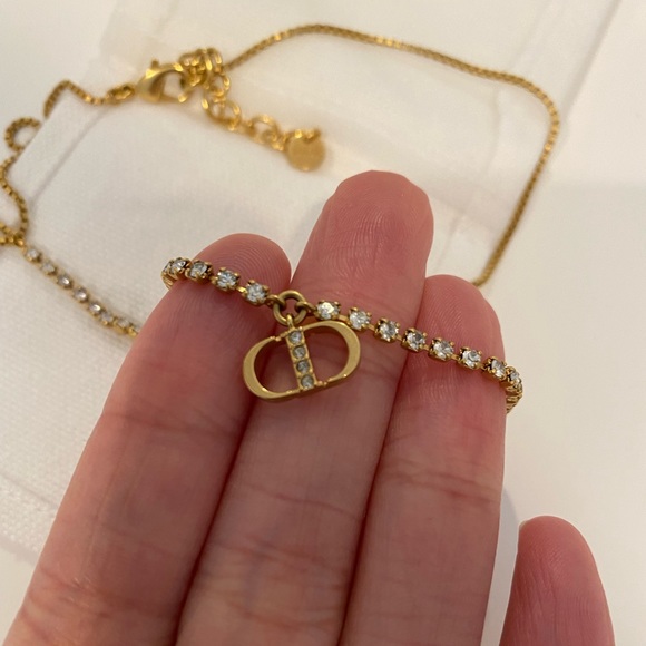 DIOR CD GOLD-FINISH METAL WITH WHITE CRYSTALS - Picture 1 of 5